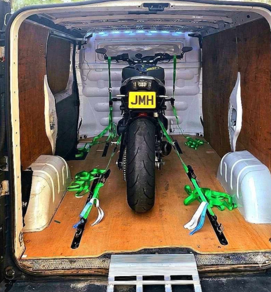 Motorcycle securely loaded for transport by JMH Motorcycle Transport
